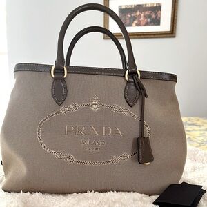 Prada canvas and leather hand bag.